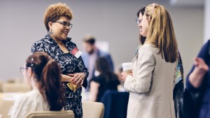 Dr. Venoncia Baté-Ambrus, executive director, Healthcare Foundation of Northern Lake County, speaks with Dr. Melissa Chen and Dr. Julie Creaden at the Health Equity Breakfast.