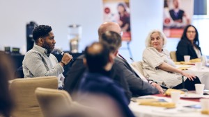Damarr Smith, a program officer for the Steans Family Foundation, participates in the Q&A session at RFU’s Health Equity Breakfast.