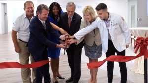 From left to right: Illinois State Representative Tom Weber, Interim Provost James Carlson, PhD, PA-C, CHSE-A, Kimberley Darey, MD ’04, RFU President Aron Sousa, MD, Illinois State Senator Julie Morrison, Nikolas Vlaho SCPM ’29