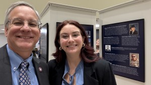 Aron and physician assistant student Brittani Garayalde, CHP ’27, just after Brittani’s wonderful Veterans Day Talk and just before Aron ate cake. That’s Brittani’s picture from her time in the Air Force in the upper right.