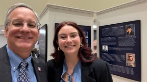 Aron and physician assistant student Brittani Garayalde, CHP ’27, just after Brittani’s wonderful Veterans Day Talk and just before Aron ate cake. That’s Brittani’s picture from her time in the Air Force in the upper right.