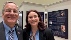 Aron and physician assistant student Brittani Garayalde, CHP ’27, just after Brittani’s wonderful Veterans Day Talk and just before Aron ate cake. That’s Brittani’s picture from her time in the Air Force in the upper right.
