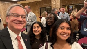 Aron with College of Pharmacy students Riya Kini ‘28, Leah Rogers ‘27, Abigail Noble ‘28