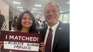 Aron with one of our matching students, Aayushi Daji, P4, Class President!
