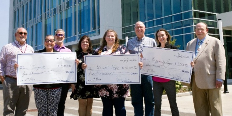 The winners of RFU's Inaugural Biotech Startup Competition accept their awards from Executive Vice President for Research Ron Kaplan, PhD (right). The winners of RFU's Inaugural Biotech Startup Competition accept their awards from Executive Vice President for Research Ron Kaplan, PhD (right).