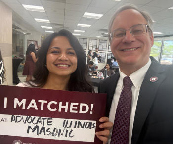 Aron with one of our matching students, Aayushi Daji, P4, Class President!