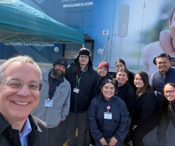 Aron with the Community Care Connection team and the mobile truck.