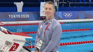 A few weeks after returning from the COVID-delayed 2020 Tokyo Olympics, Brian Cunningham, DPT ’08, reflected on his role in preparing Caeleb Dressel and other members of the U.S. swim team to chase down 30 total medals, seven Olympic records and two world records. (Photos provided by Dr. Cunningham)