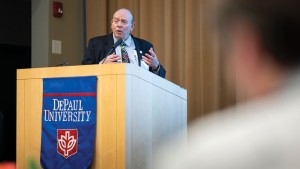 Dr. Kaplan addresses the alliance gathering at DePaul University in fall 2022.